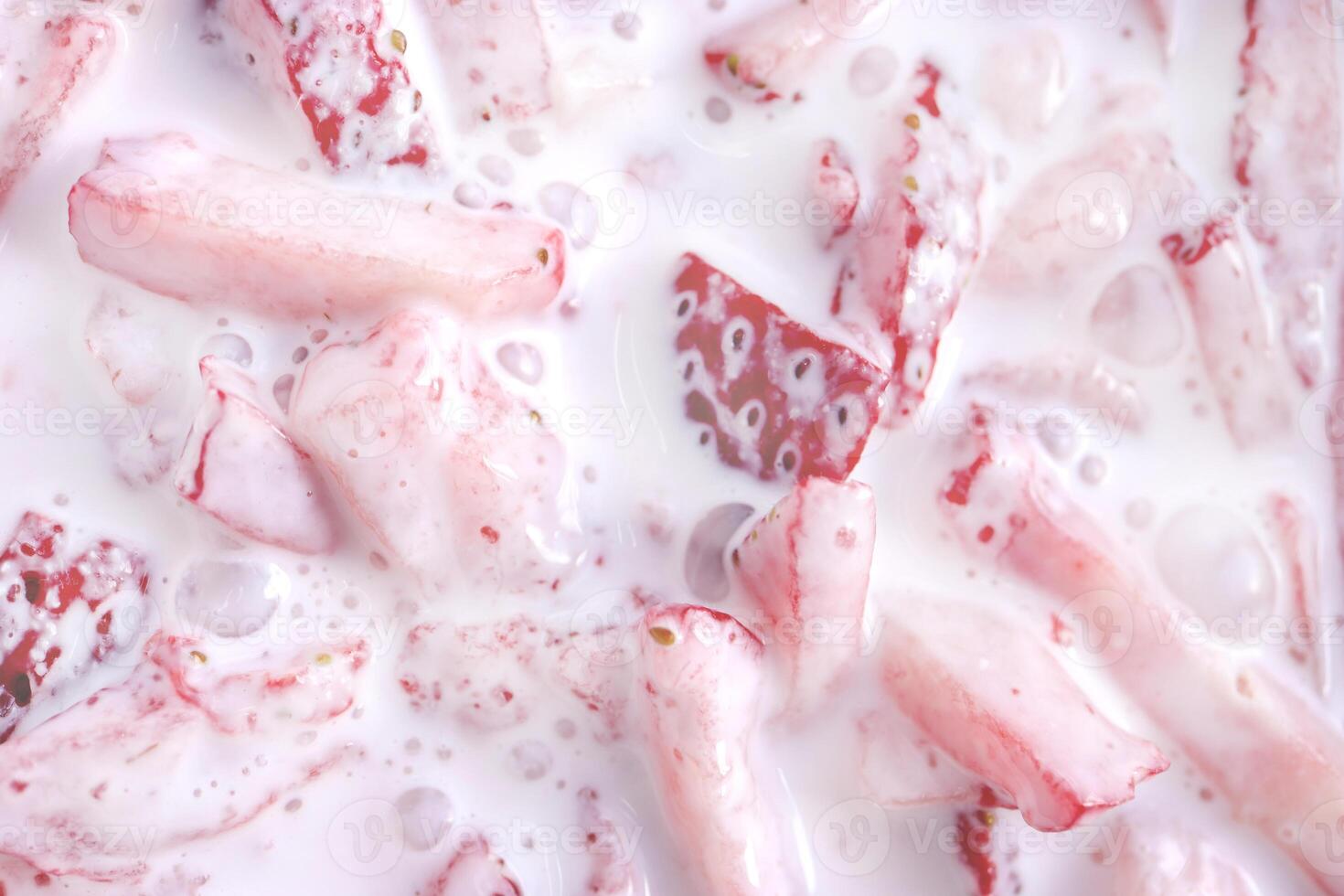Fresh vitamin berry backdrop. Cream in sliced strawberry filling background. Plum with red healthy tasty strawberry texture. photo