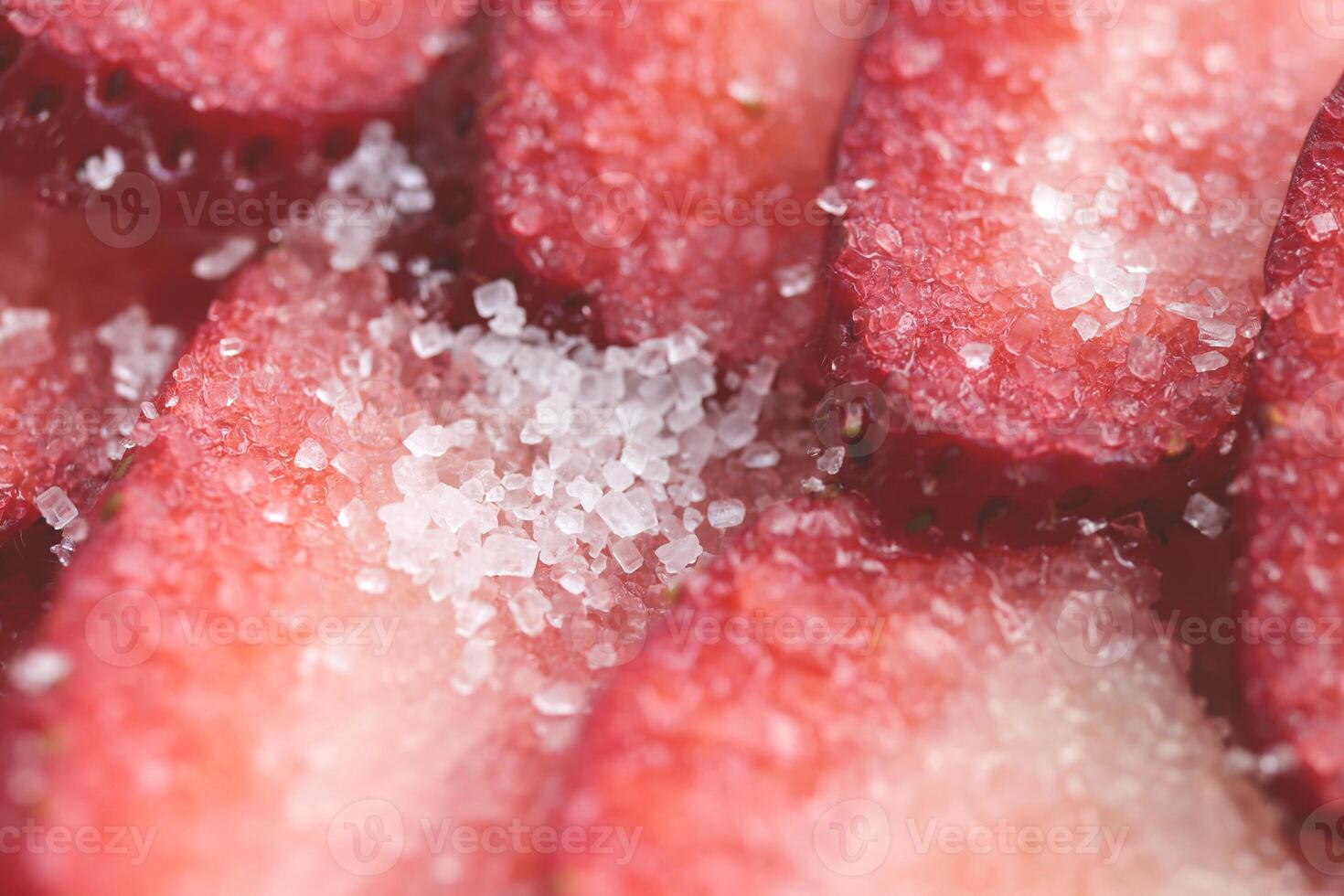 Red healthy tasty strawberry with sugar texture. Fresh vitamin berry backdrop. Sliced strawberry in sugar filling background. photo