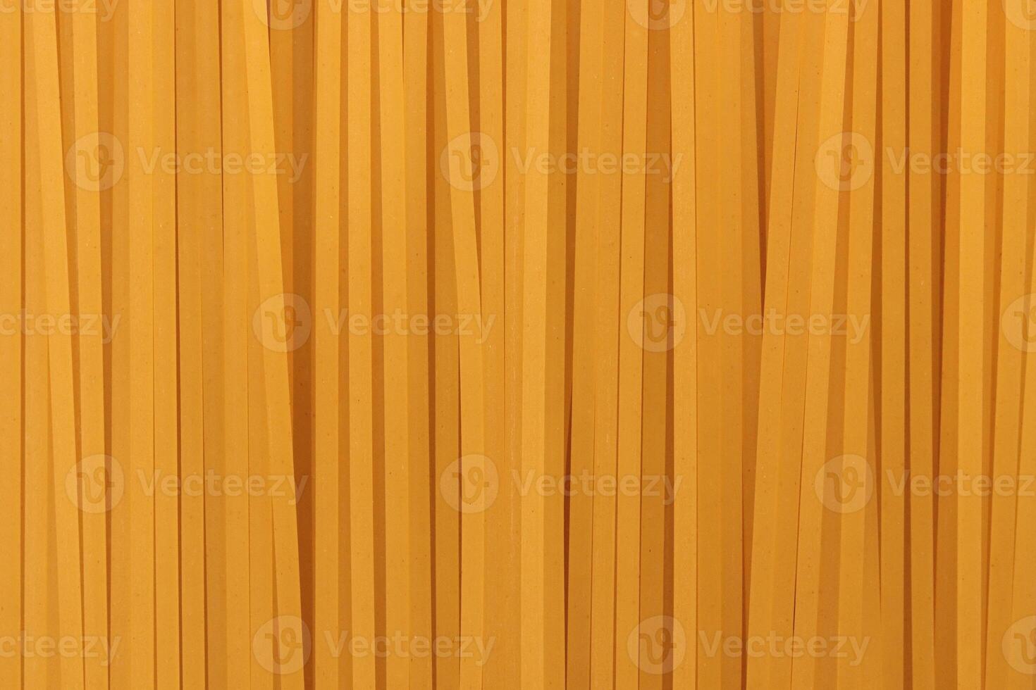 Macaroni backdrop. Pasta filling background. Spaghetti texture. photo