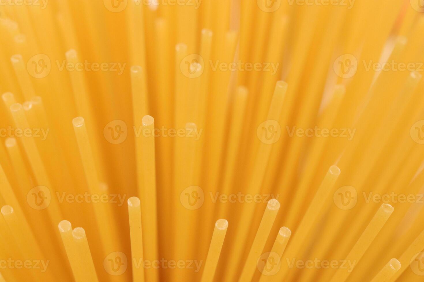 Pasta filling background. Spaghetti bunch texture. Macaroni backdrop. photo