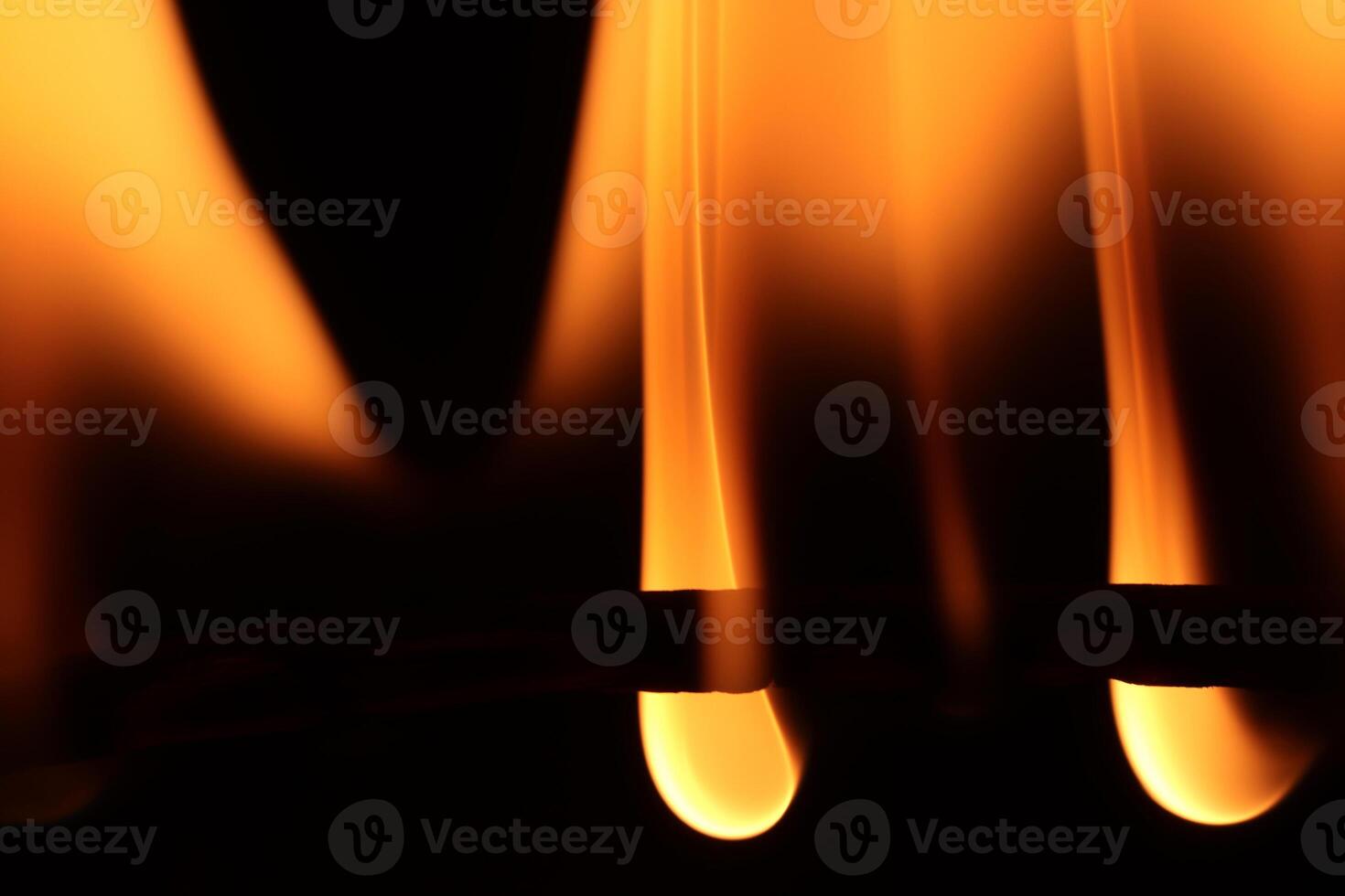Glowing dangerous burl light backdrop. Danger blazing flame. Burning flames background. Blaze fire texture. photo