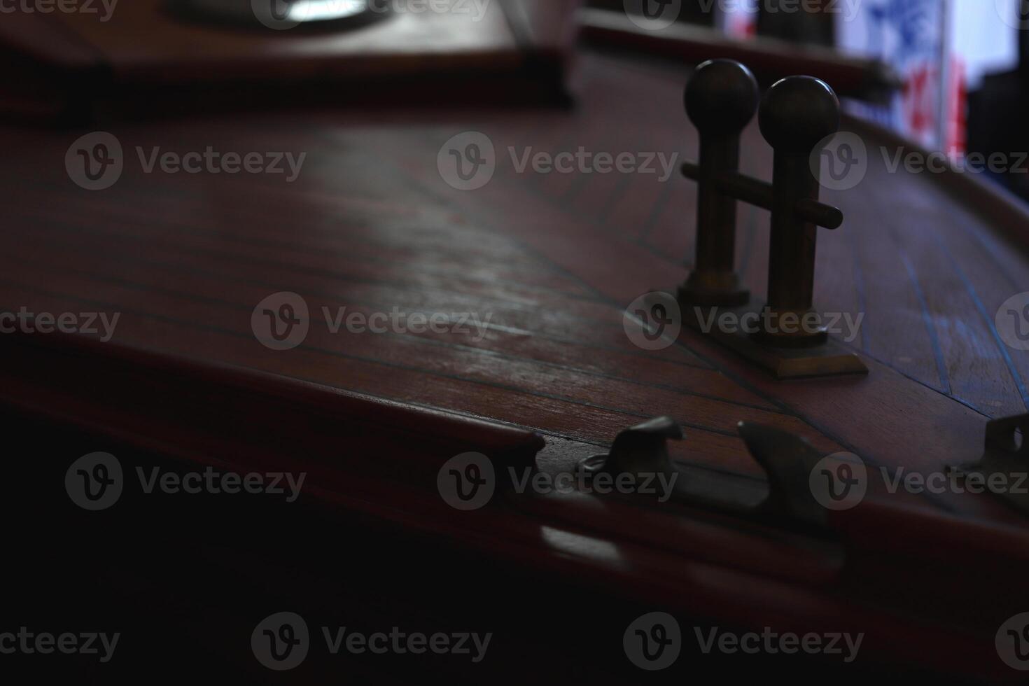 Duck for mooring on the deck of a varnished yacht. Marine background. photo