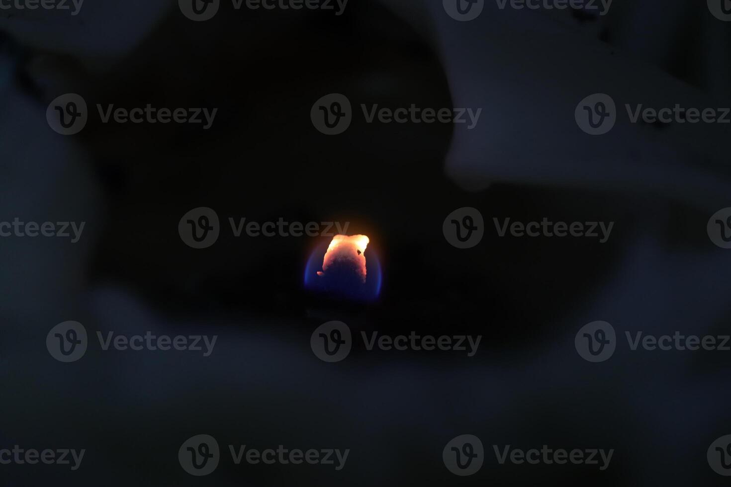 Little fire spark. Warm background. photo