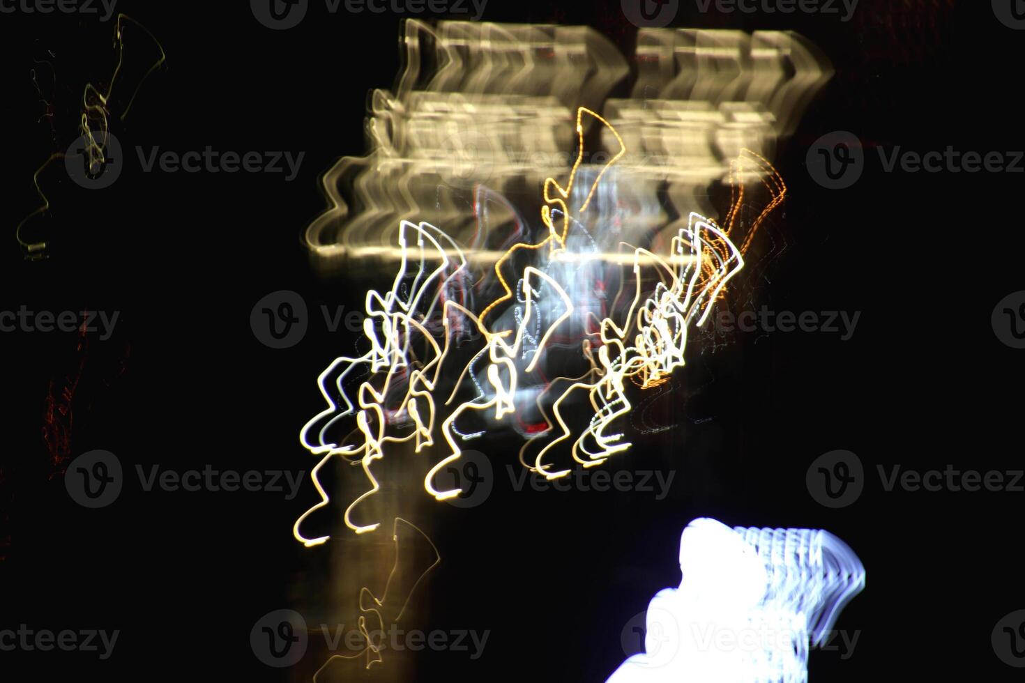 Night exposure shake traces background. Light lines leaks exposition backdrop. Night city rays glow texture. photo