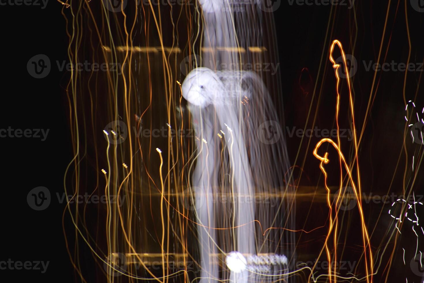 Night exposure zoom traces background. Light lines leaks exposition backdrop. Night city rays glow texture. photo