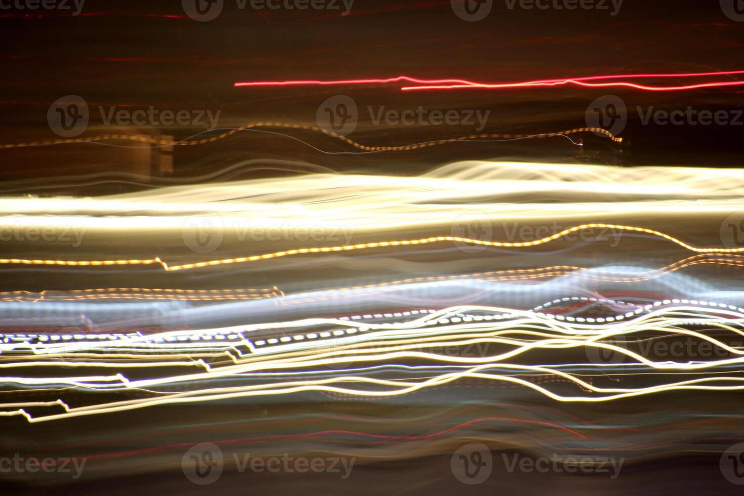 Night exposure zoom traces background. Light lines leaks exposition backdrop. Night city rays glow texture. photo
