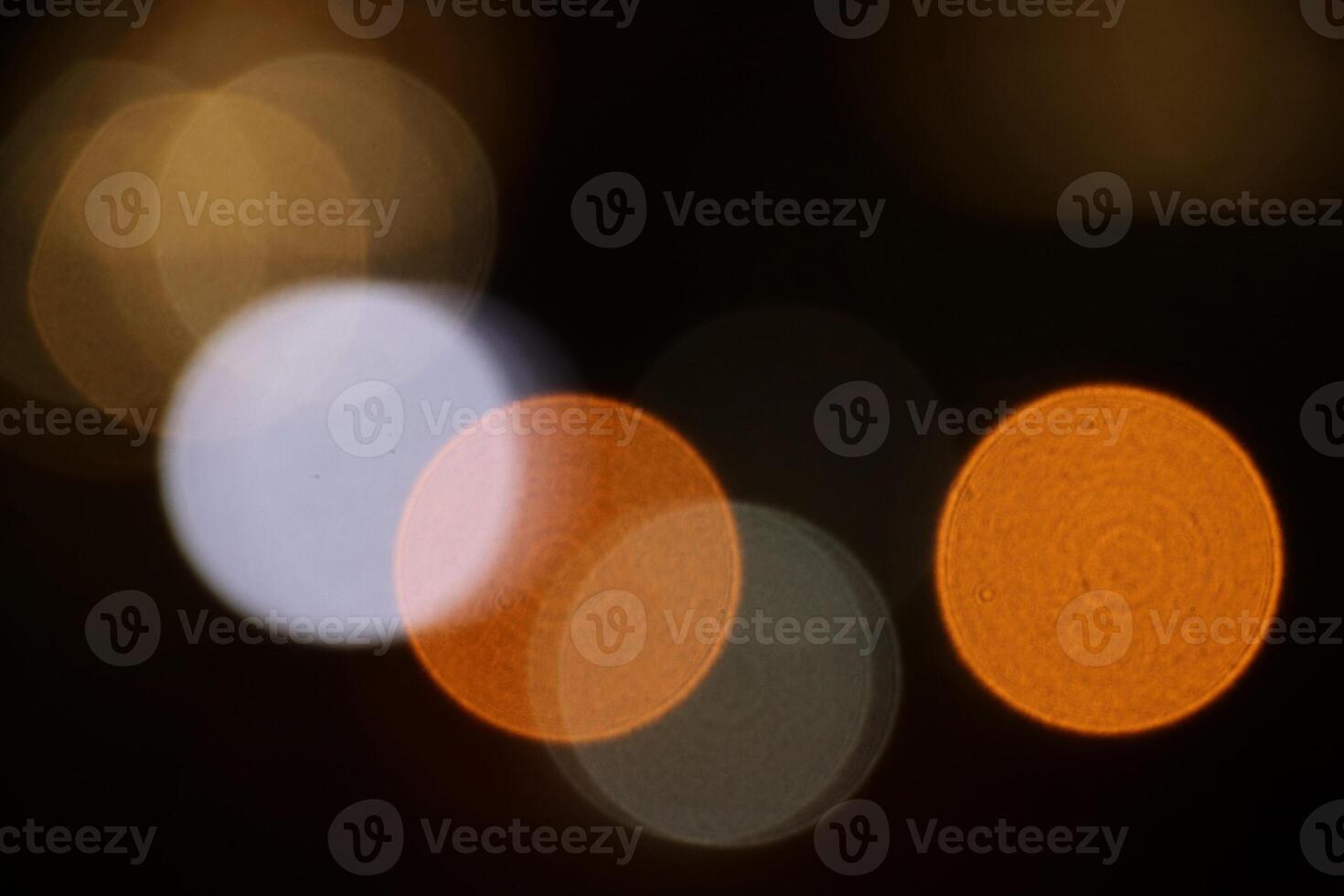 Blurred lights background. Lens bokeh backdrop. Flare lights overlays. Abstract bright blurred colored bokeh. photo