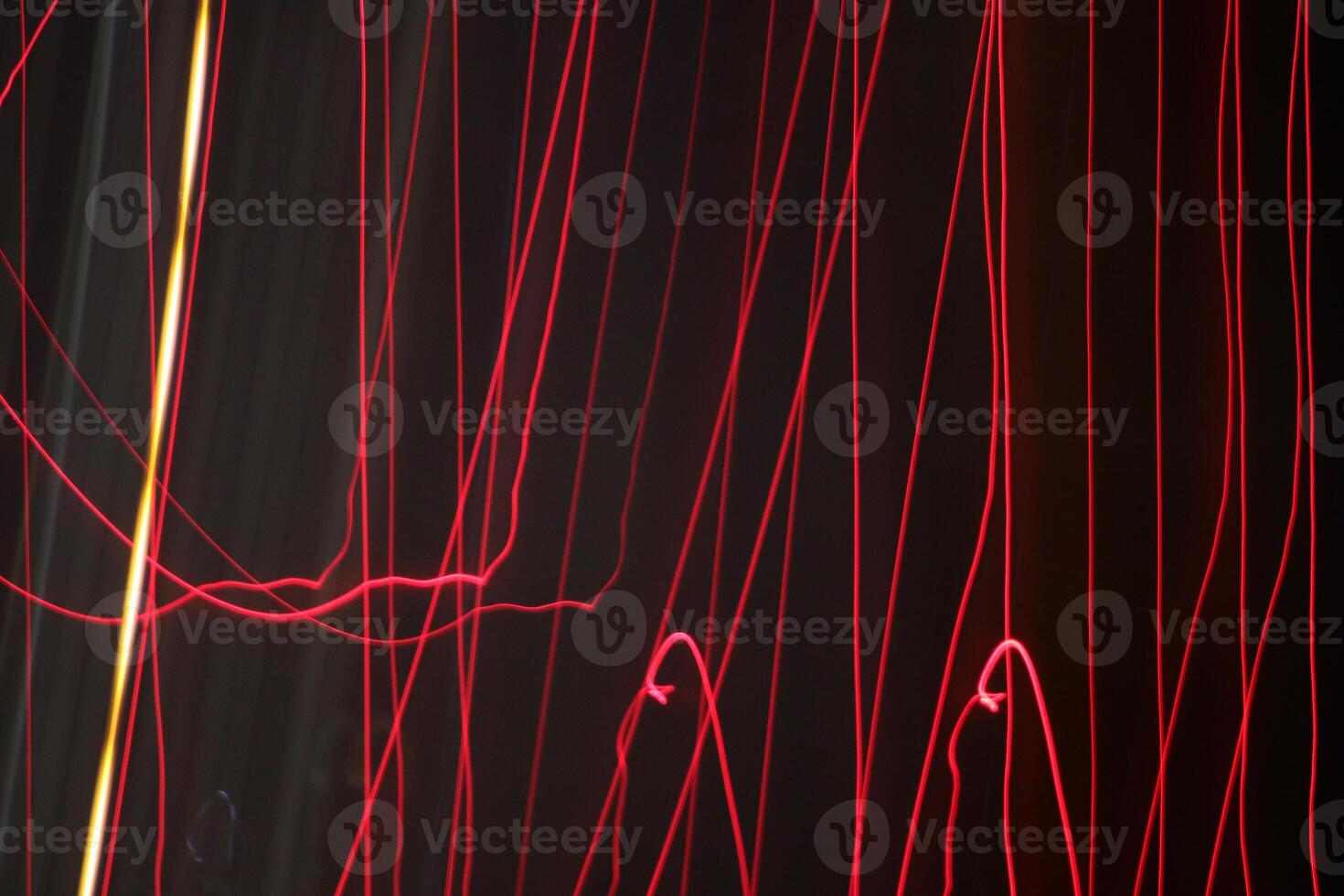 Night exposure zoom traces background. Light lines leaks exposition backdrop. Night city rays glow texture. photo