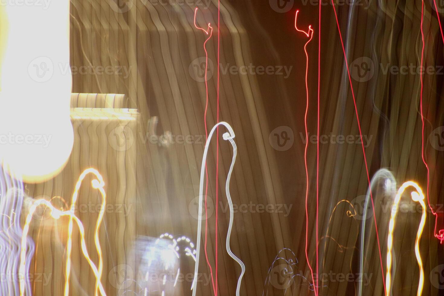 Light lines leaks exposition background. Night city rays glow backdrop. Night exposure zoom traces texture. photo