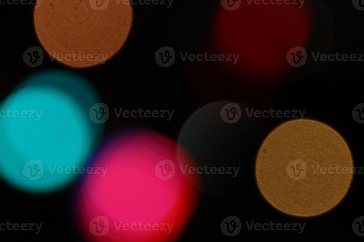 Lens bokeh backdrop. Flare color lights overlays. Abstract bright blurred colored bokeh. Blurred colored lights background. photo