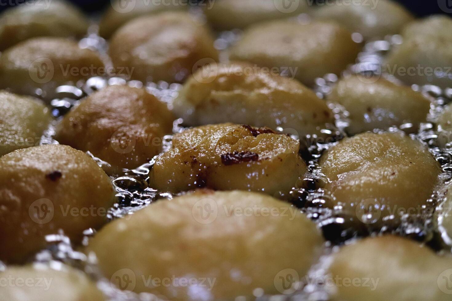 Fried in hot oil shrimp pancake snacks. Healthy organic food backdrop. Natural tasty snack. photo