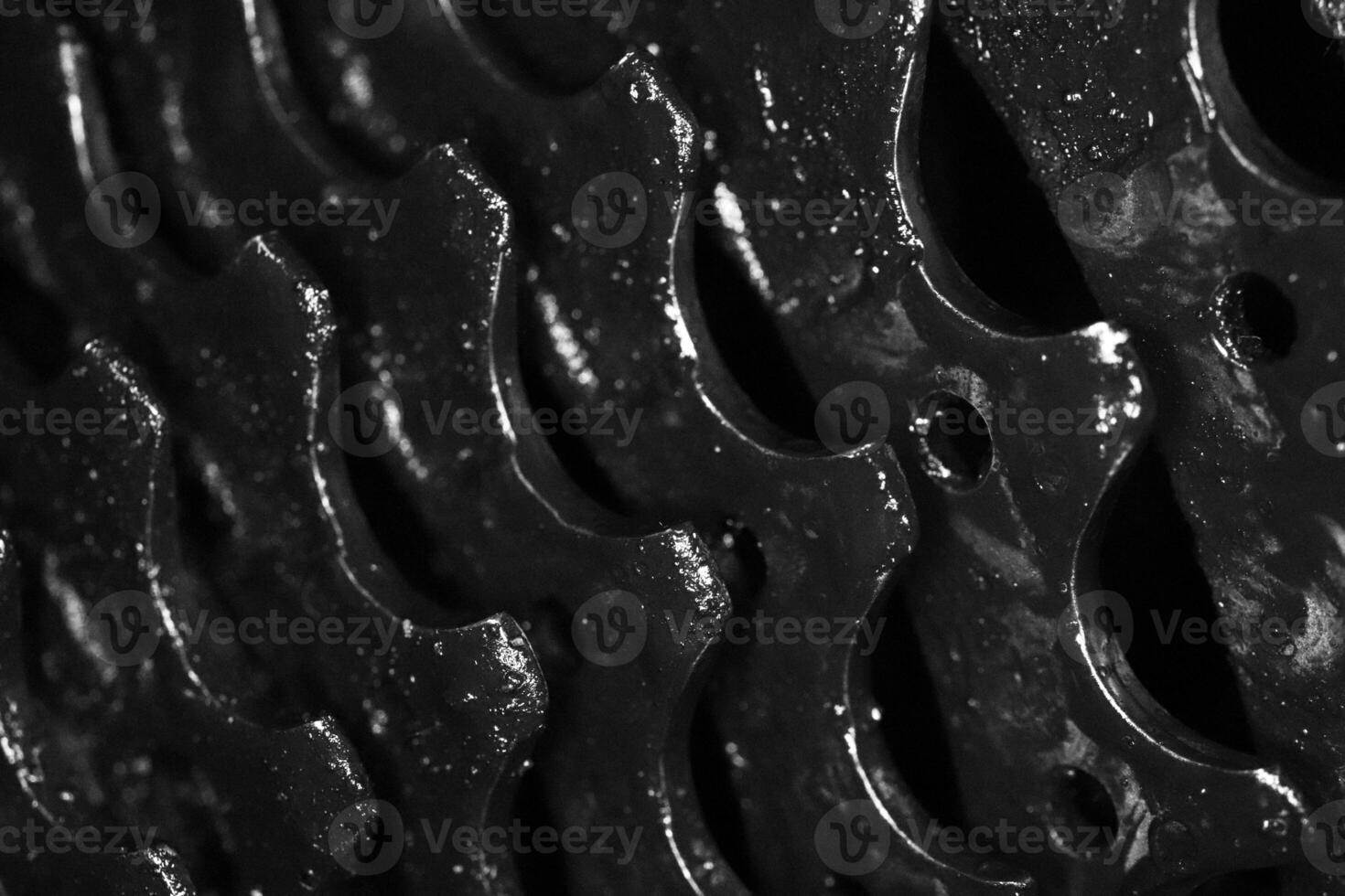 Dark Dirty Bicycle Gears Texture. Macro Monochrome Closeup Background. photo
