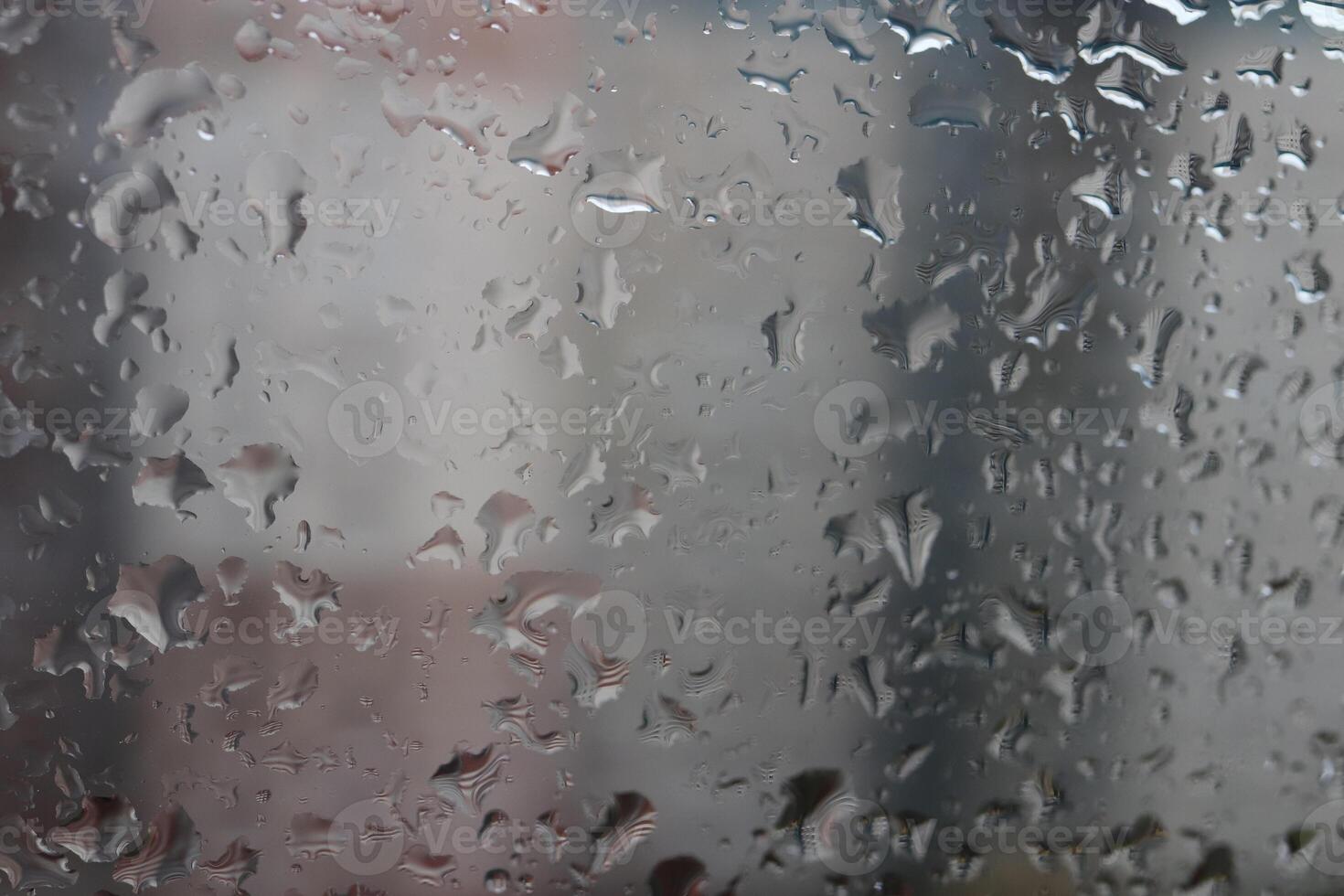 Drops of water on the window after the rain. Macro closeup photo