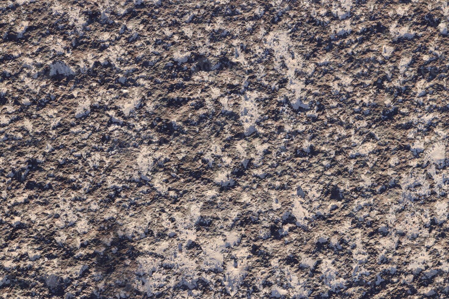 Gray textured nature stone pattern surface. photo