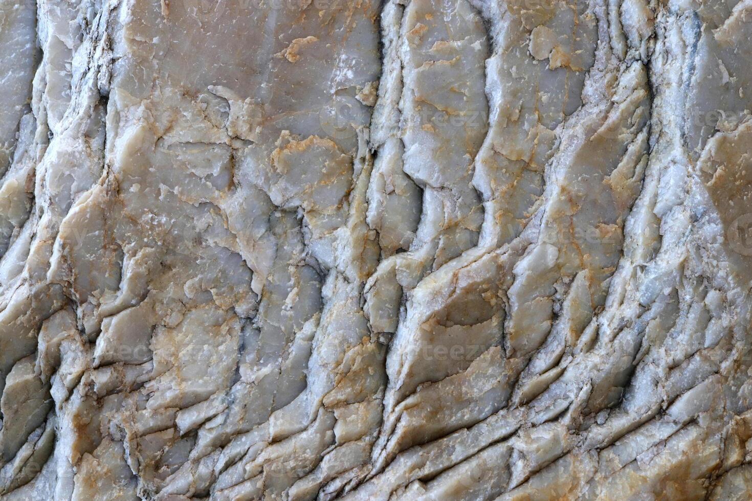 Light gray layers detailed rock background texture. photo