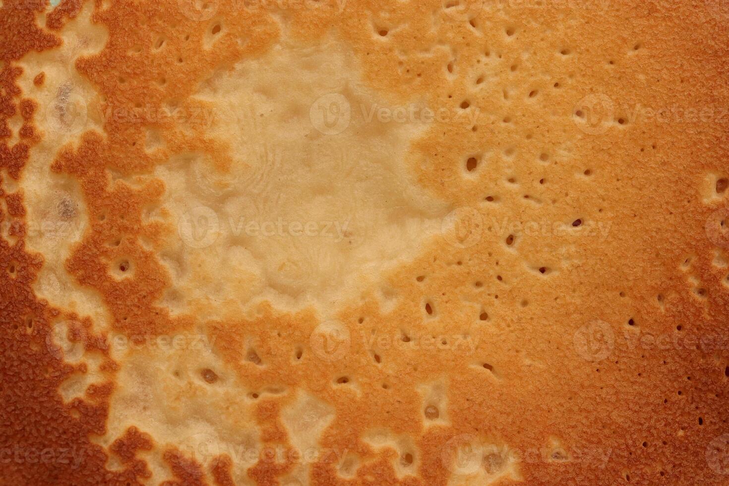 Backed tasty detail pancake background texture. Macro closeup. photo