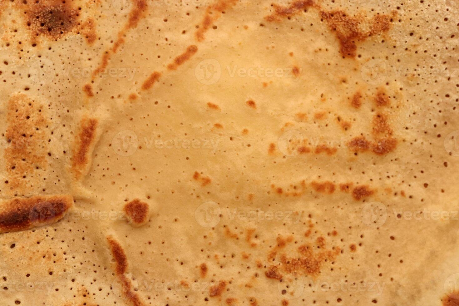Toasted tasty detail pancake background texture. Macro closeup. photo