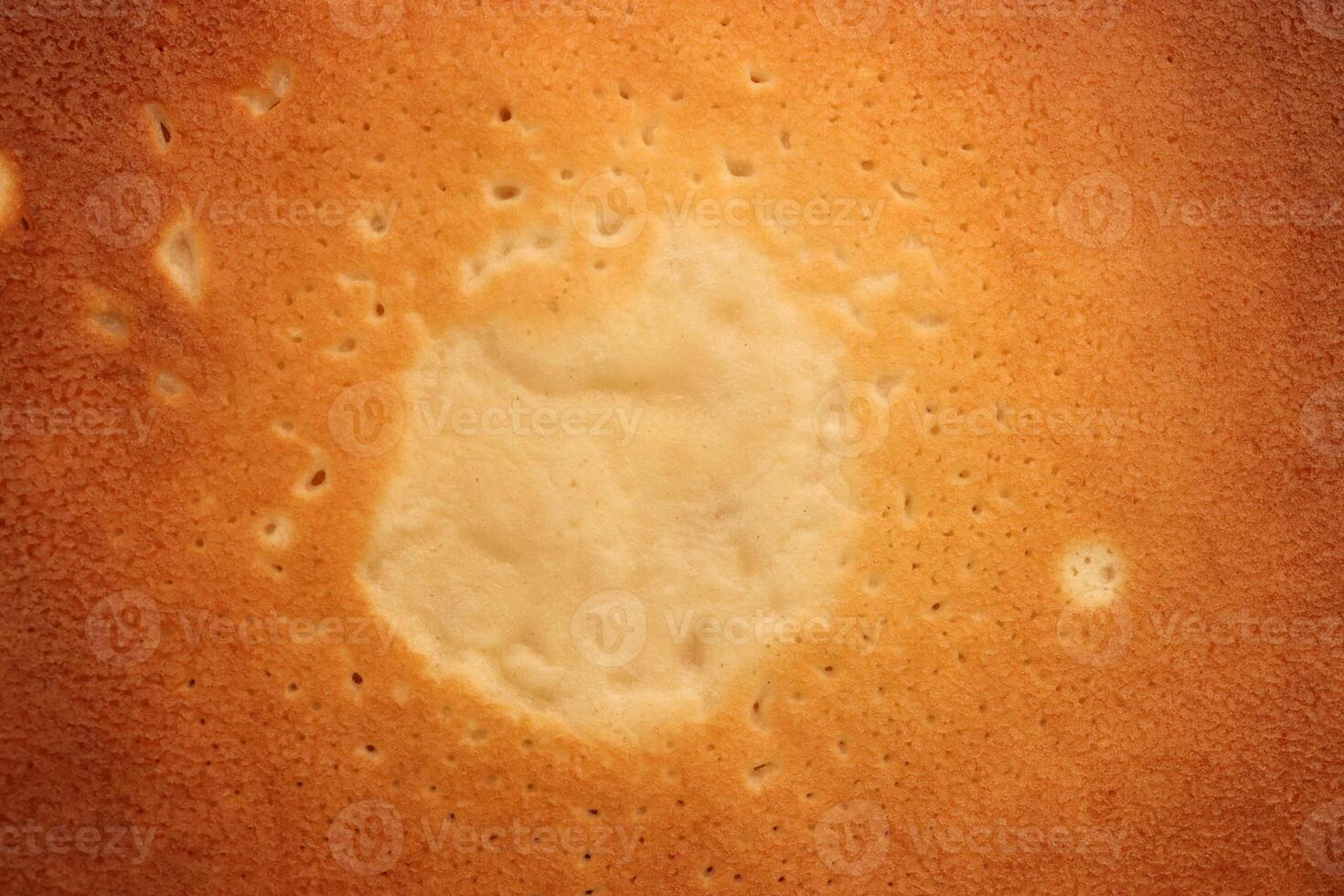 Backed tasty detail pancake background texture. Macro closeup. photo