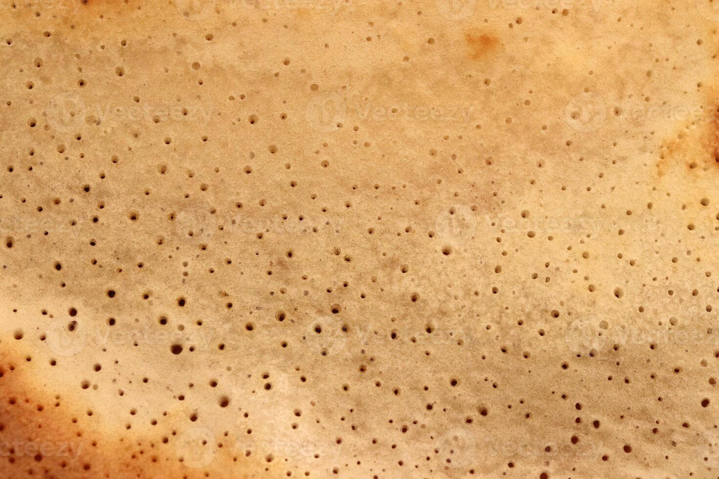 Clean traditional desert pancake pattern texture. Macro closeup. photo