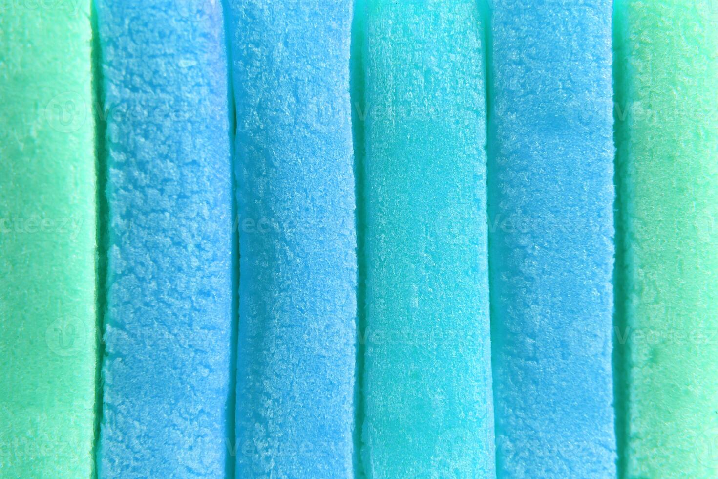 Light Sky Blue Colored Bubble Gum Texture. Freshness Gummy Delicious Background. Yummy Backdrop. Macro Closeup. photo