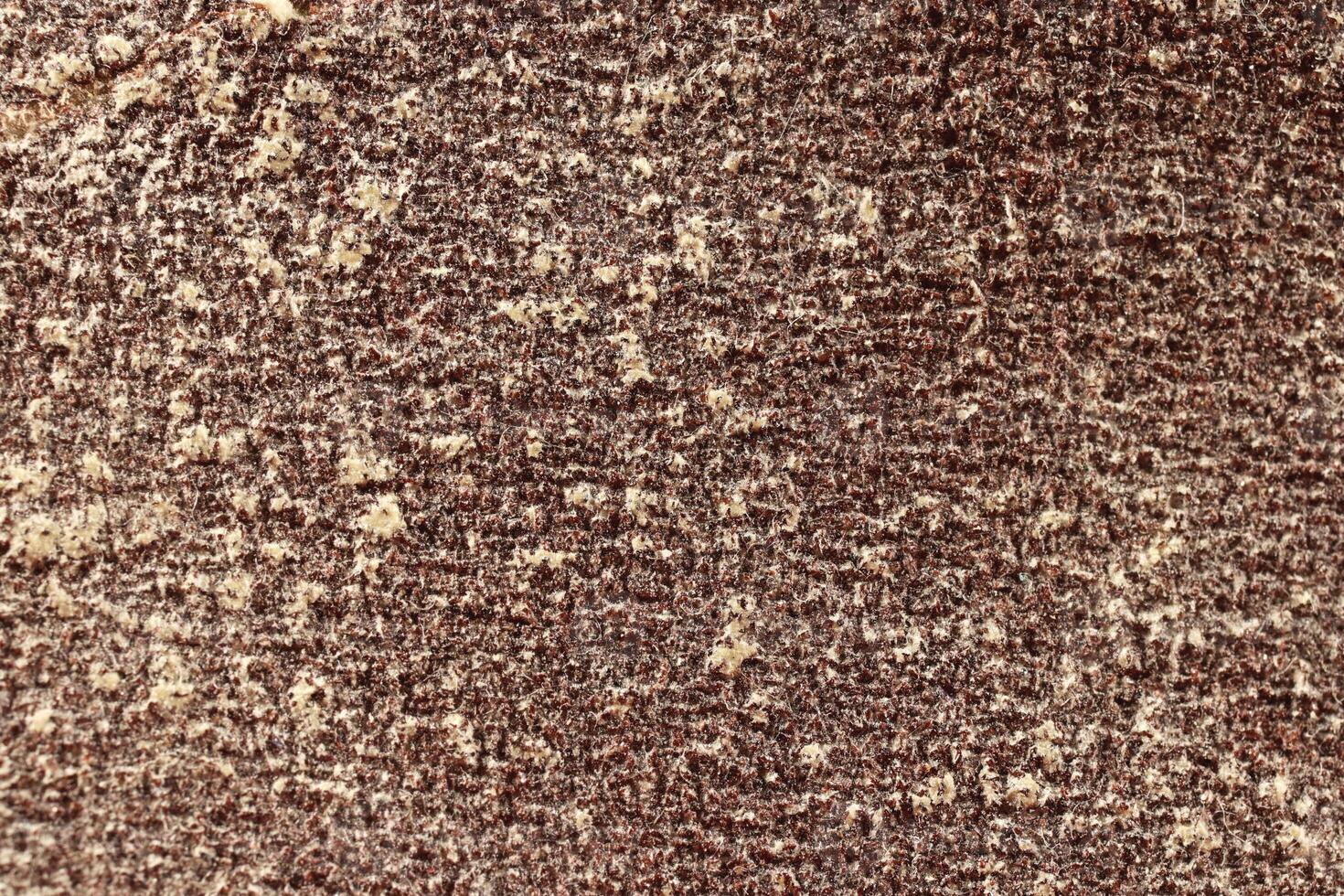 Dark Red Sandpaper Texture. Rough Grit Abrasive Background. Used Grain Emery Backdrop. Macro Closeup photo