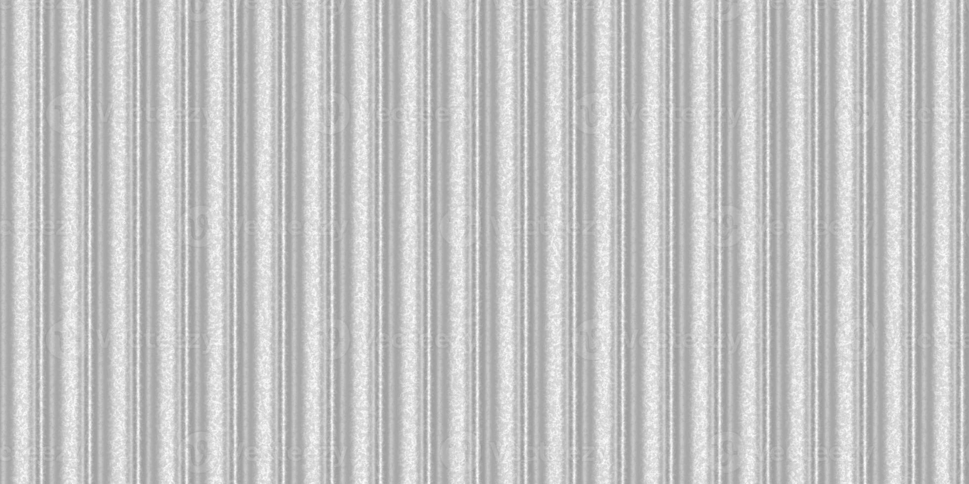 Silver white wavy iron wall pattern. Fluted metal fencing backdrop. Corrugated metal texture. Crimp fence background. Ribbed metallic surface. photo