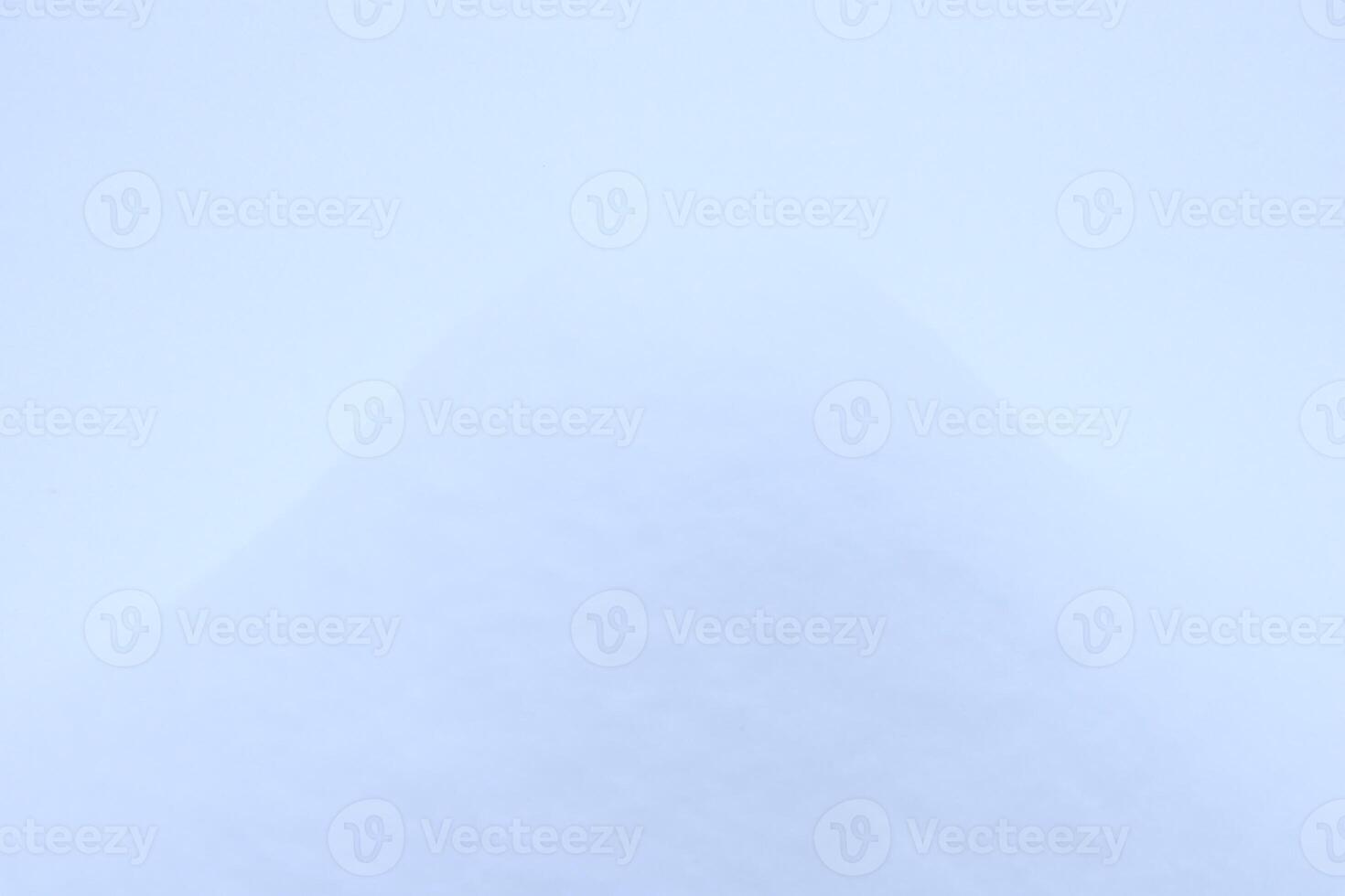 Soft snow hills surface. Snowy mound texture. Winter snowdrift landscape background. photo