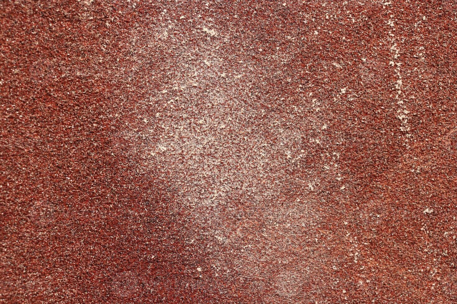 Red Sandpaper Texture. Rough Grit Abrasive Background. Used Grain Emery Backdrop. photo