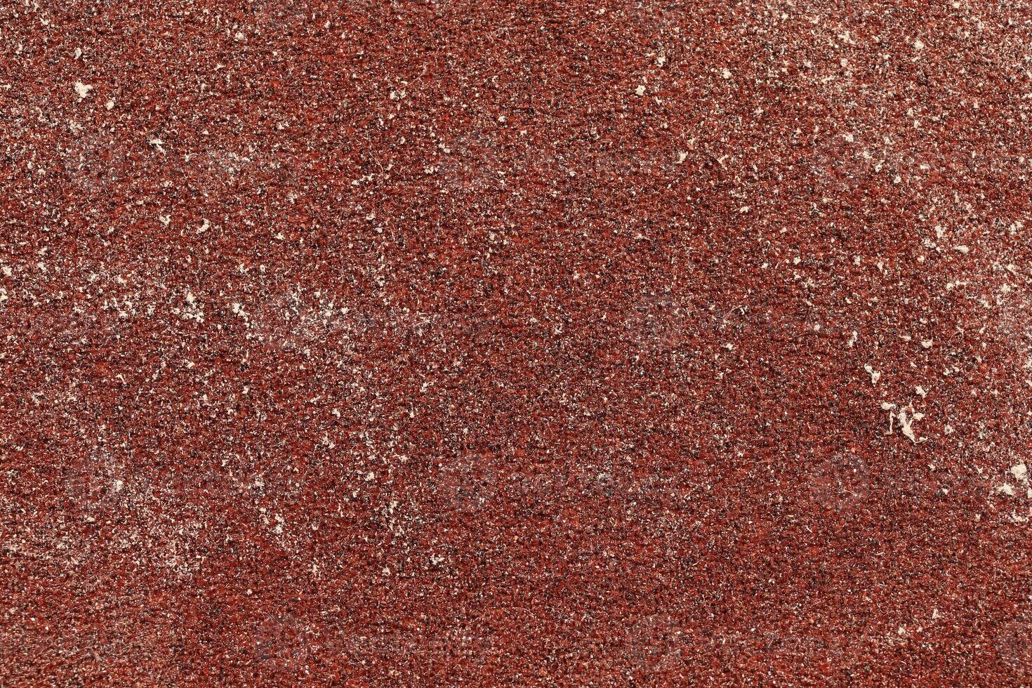 New Red Sandpaper Texture. Rough Grit Abrasive Background. Used Grain Emery Backdrop. photo