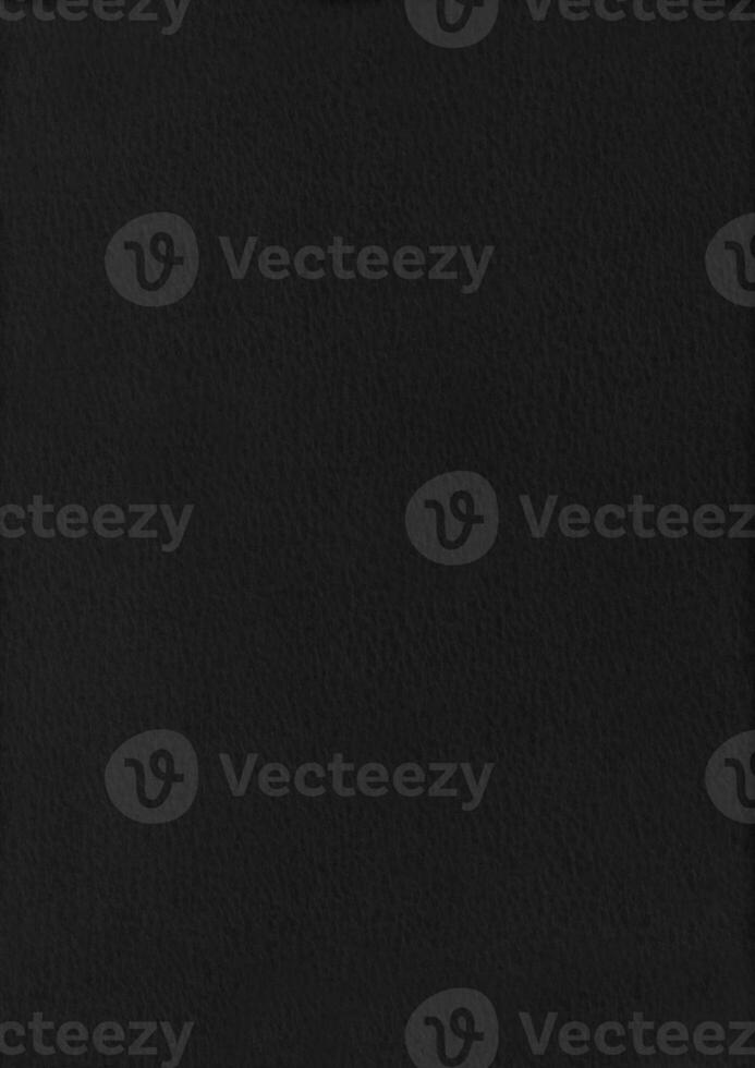 Dapple black paper corrugated texture background. photo