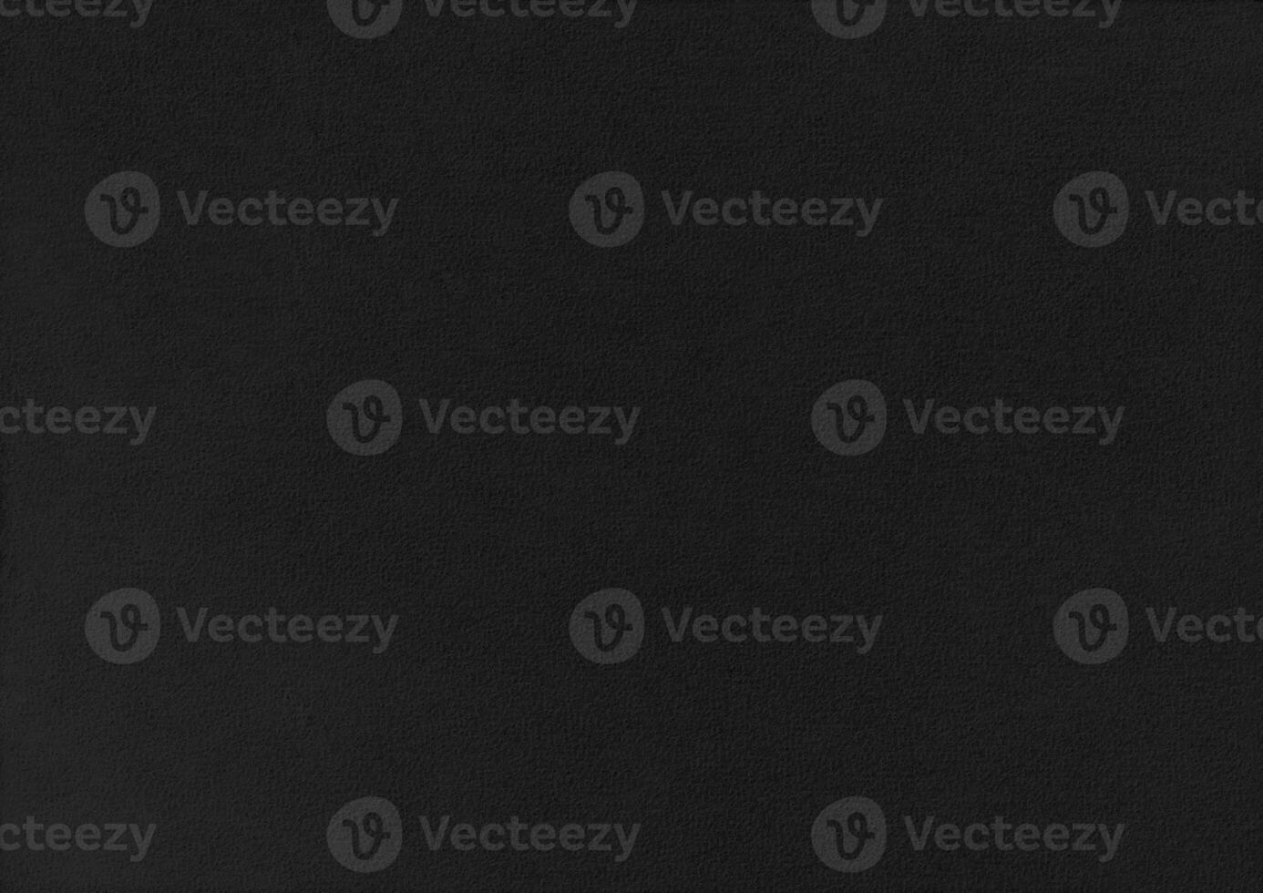 Black paper corrugated texture background. photo