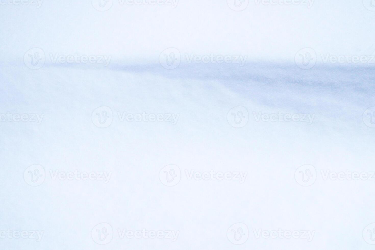 Snowy wind mound background. Winter cold weather texture. photo