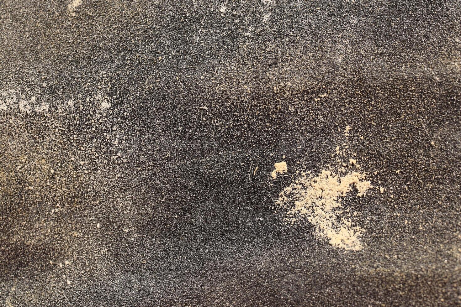 Black Sandpaper Texture with Wood Attrition. Rough Grit Abrasive Background. Used Grain Emery Backdrop. photo