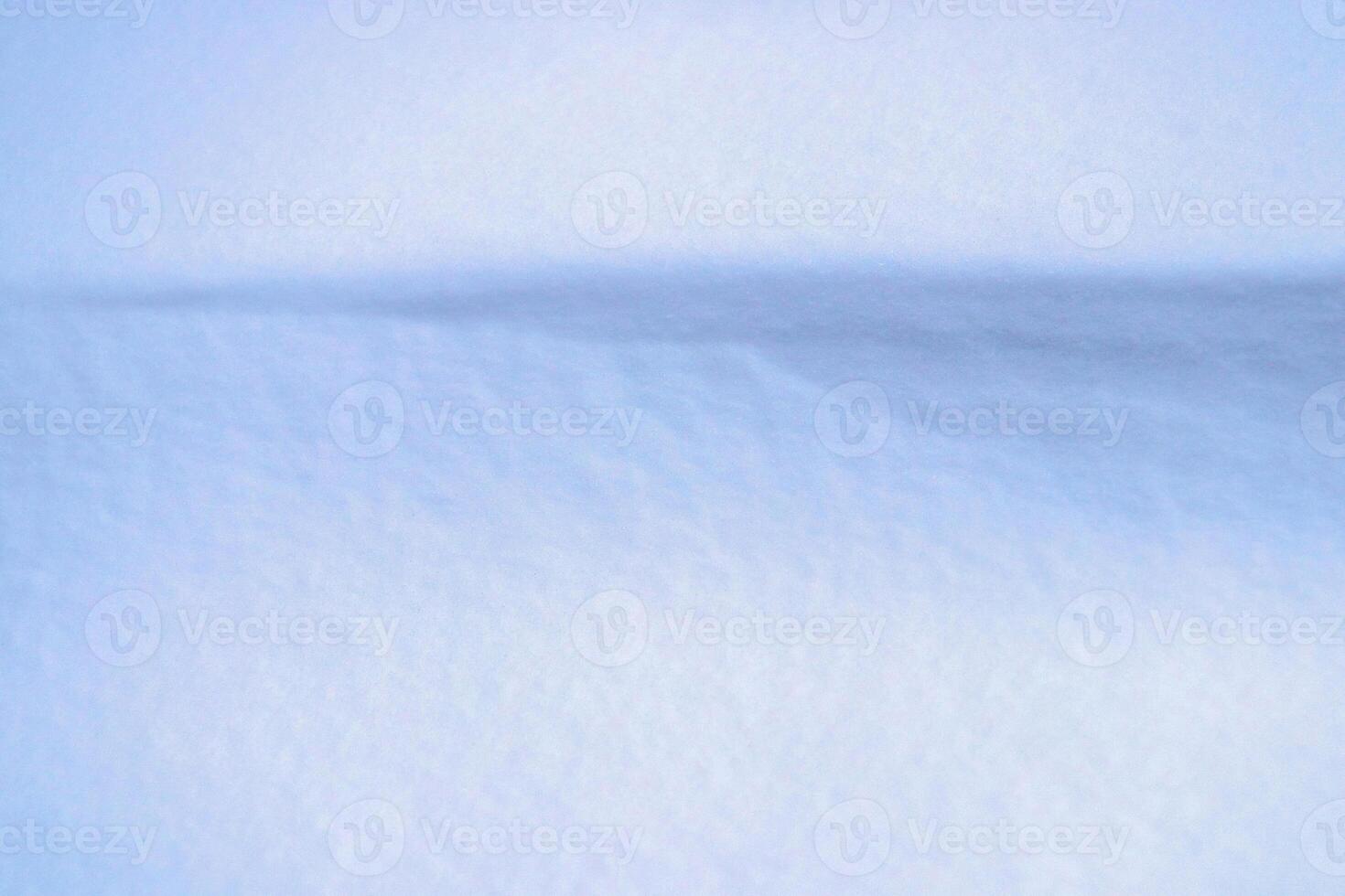 Snowy wind mound background. Winter cold weather texture. photo