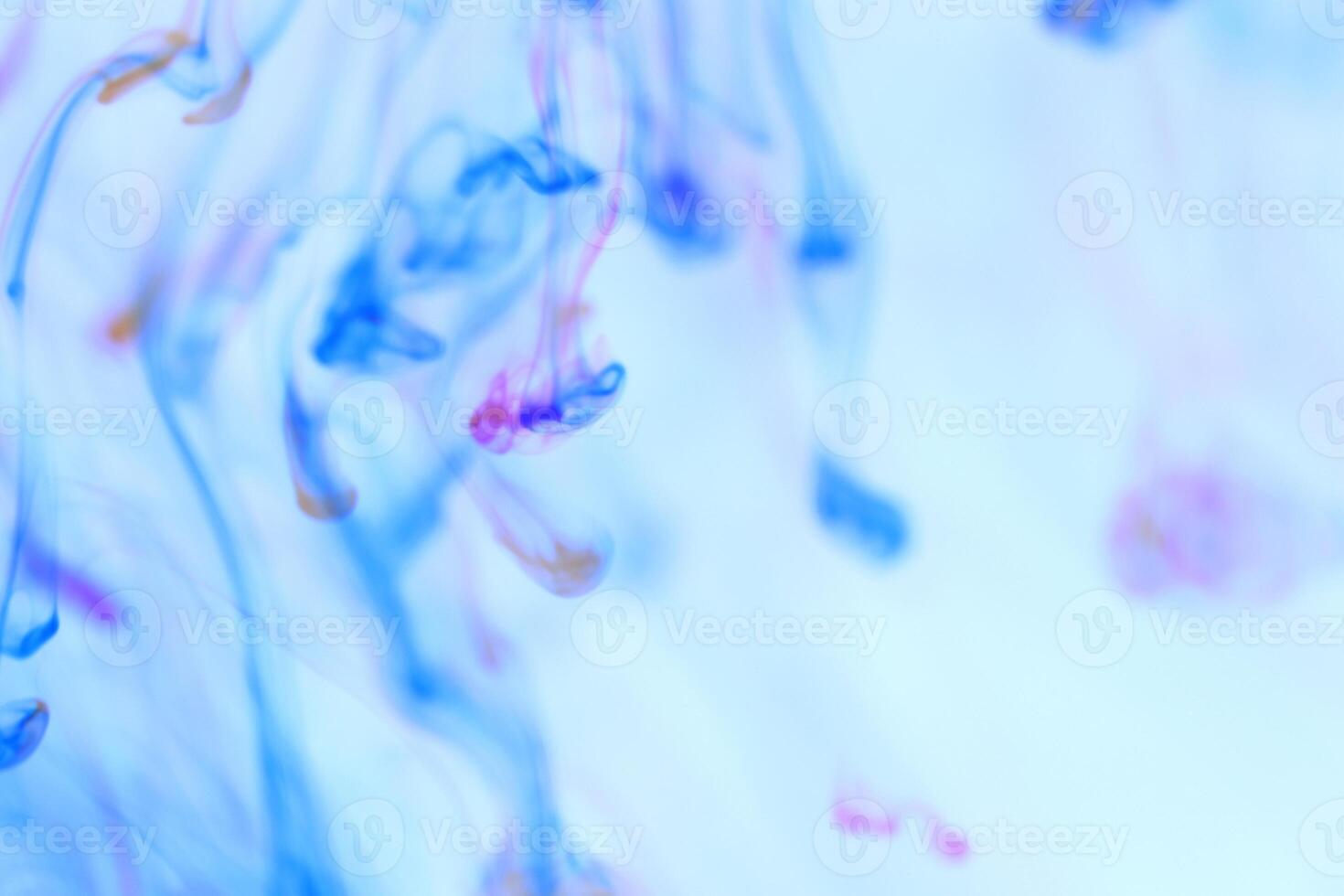 Falling Ink Drops Motion Dynamic in Water Liquid Fantasy. Soft Ambient Background. photo