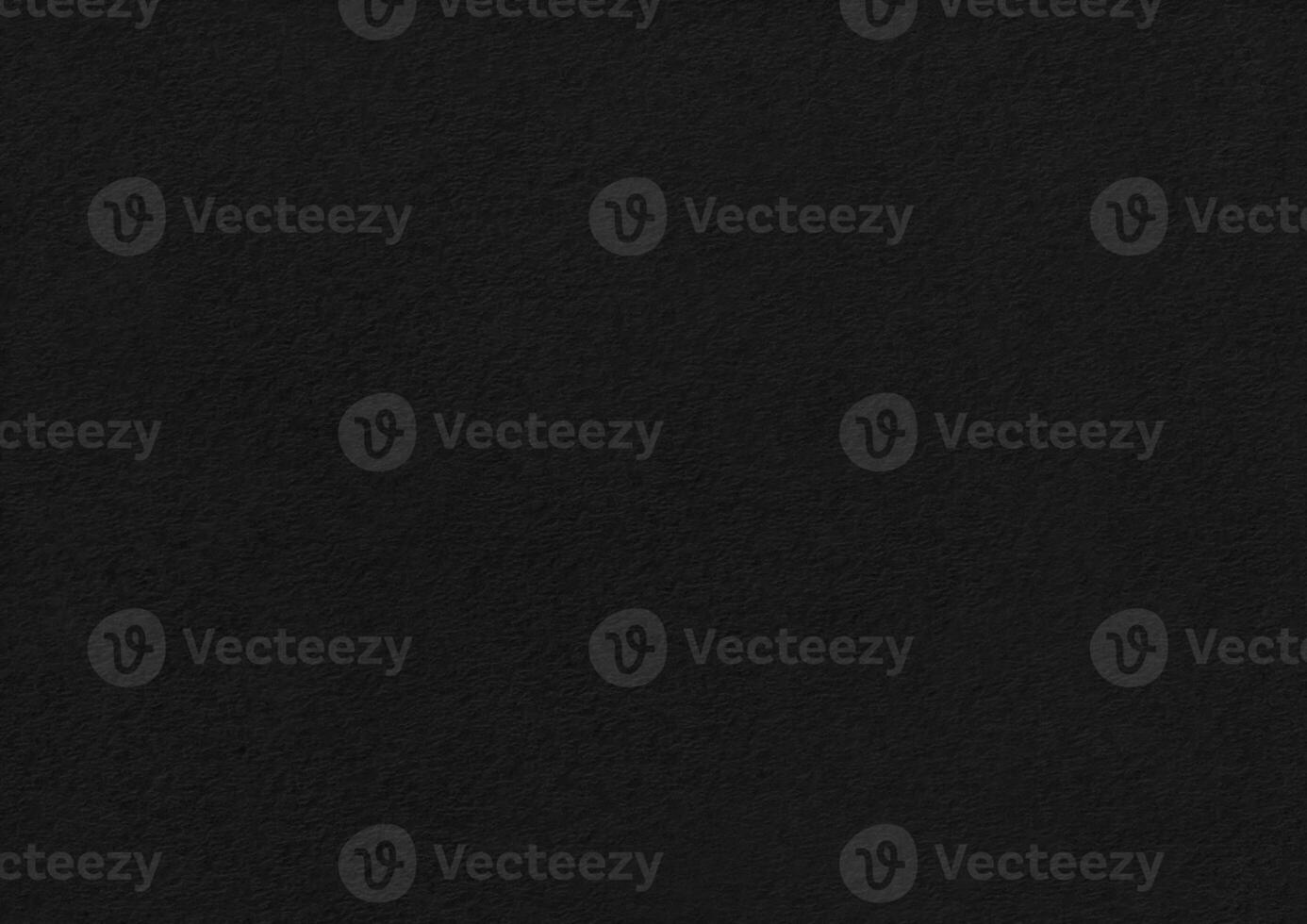 Black paper corrugated texture background. photo