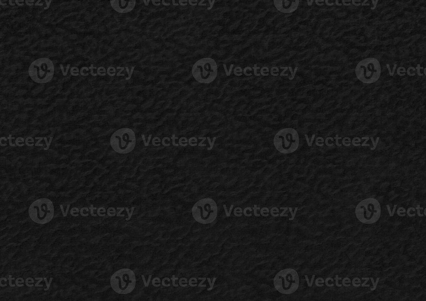 Black paper corrugated texture background. photo