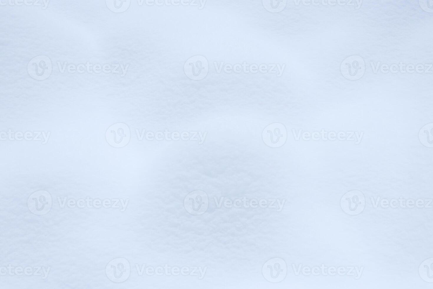 Soft snow hills surface. Snowy mound texture. Winter snowdrift landscape background. photo