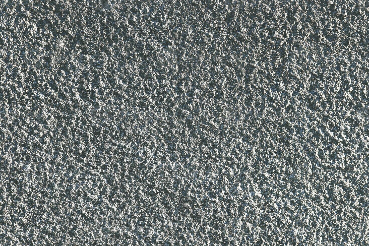 Rough blue granite wall texture. Granite surface background. photo