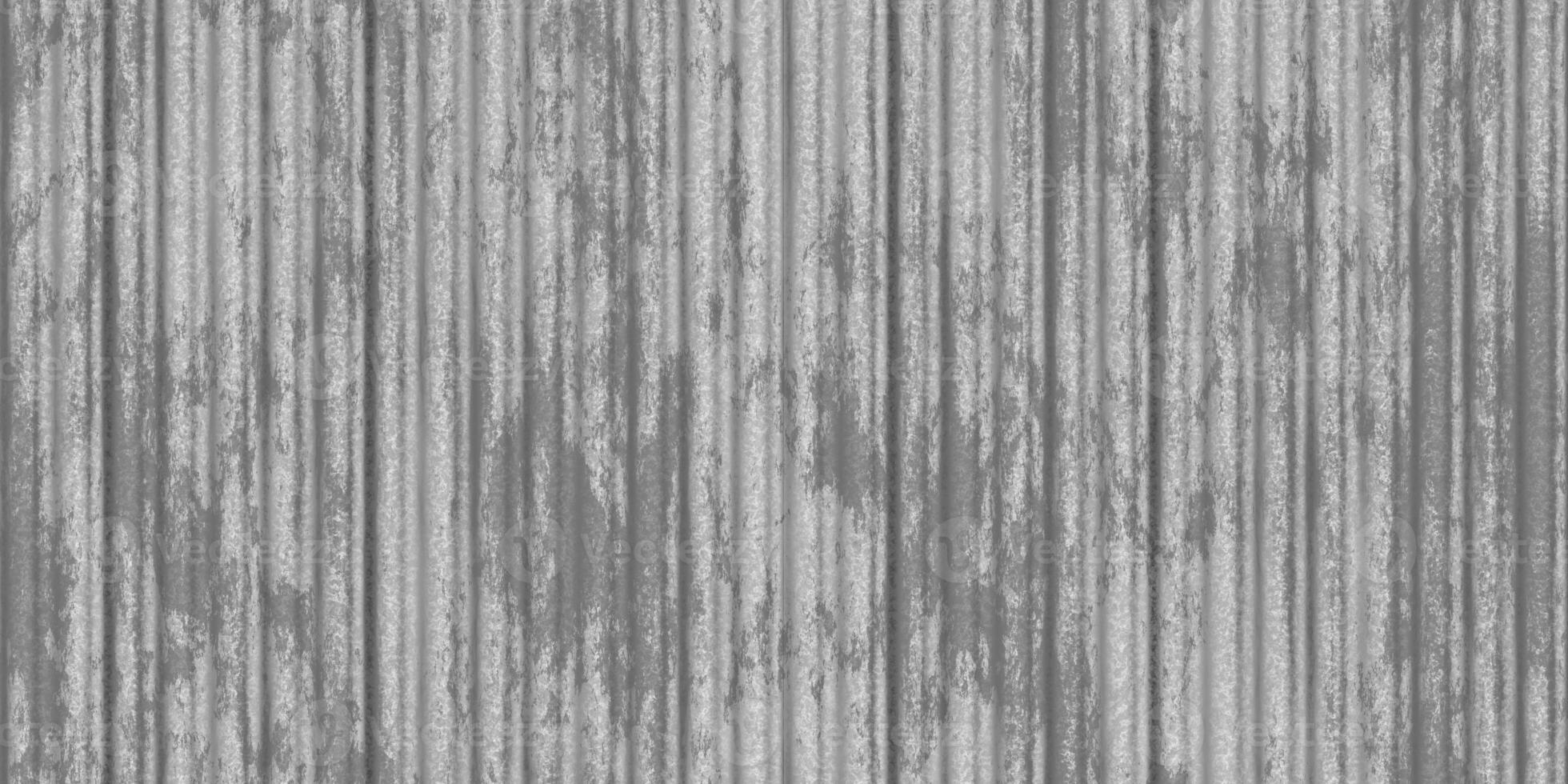 Gray dirty wavy iron wall pattern. Fluted metal fencing backdrop. Corrugated metal texture. Crimp fence background. Ribbed metallic surface. photo