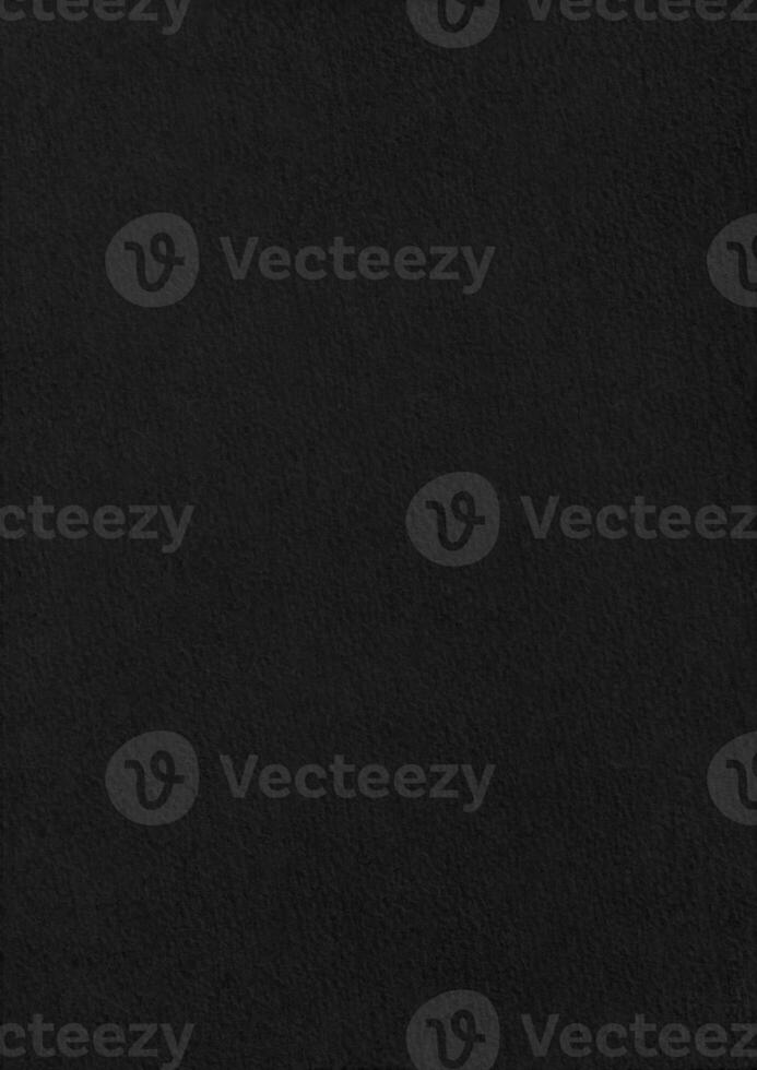 Stucco black paper corrugated texture background. photo