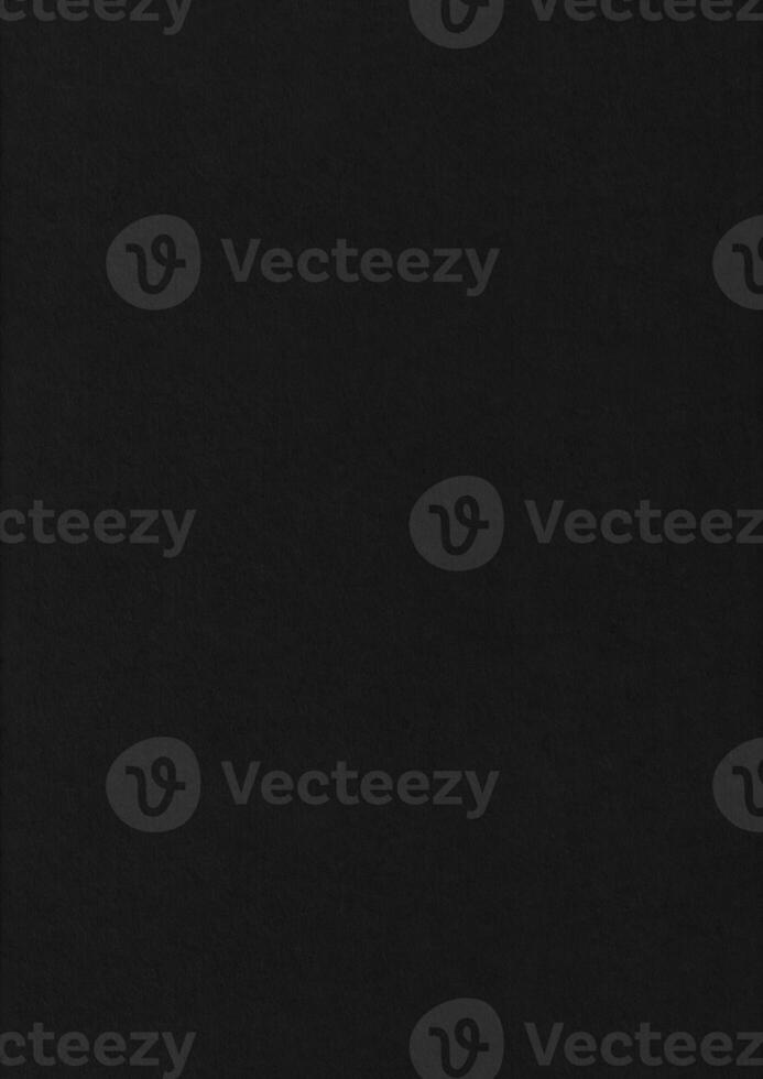 Unembossed black paper corrugated texture background. photo