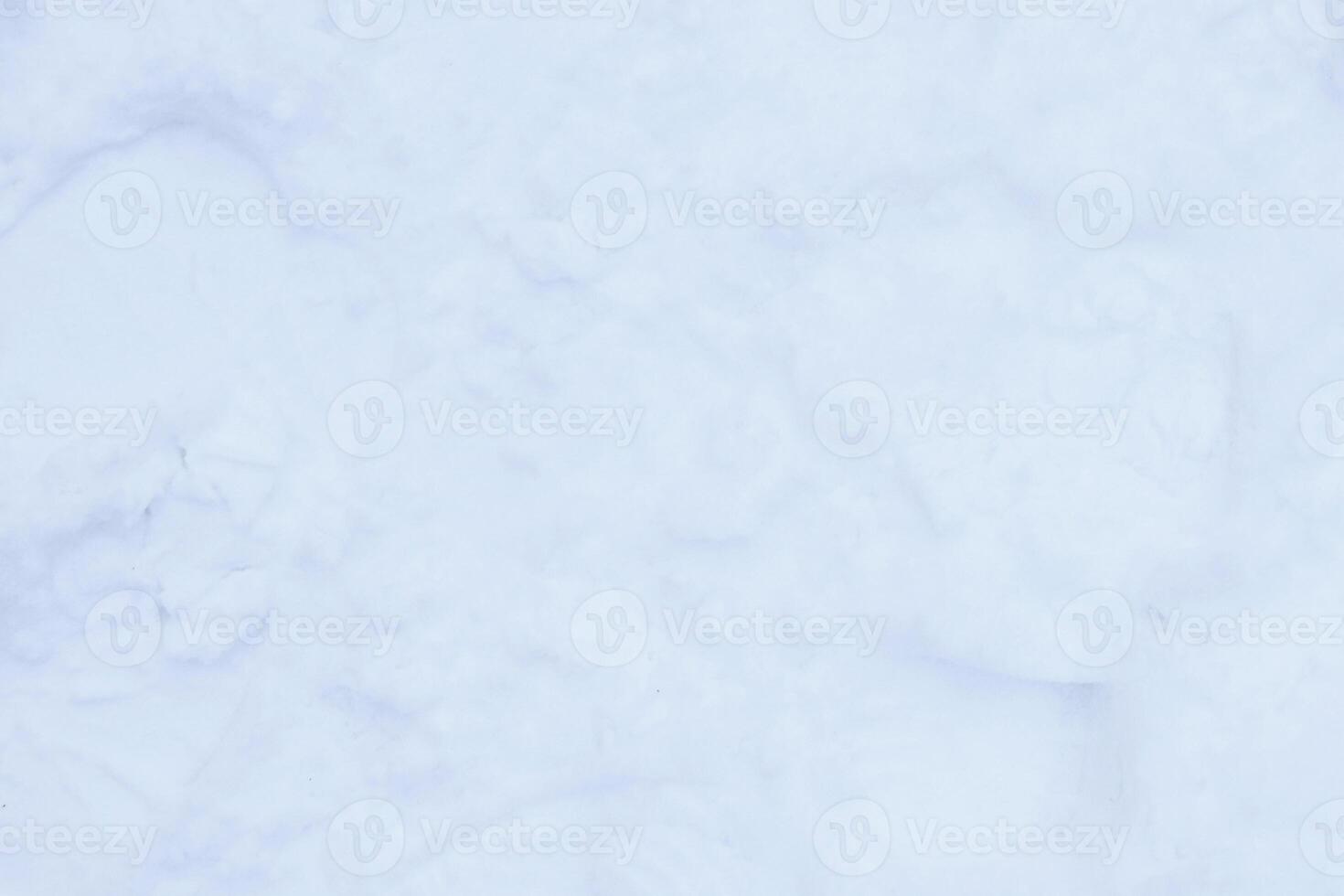 Shoe sole traces background. Snow boots tracks surface. Ski boots texture. photo