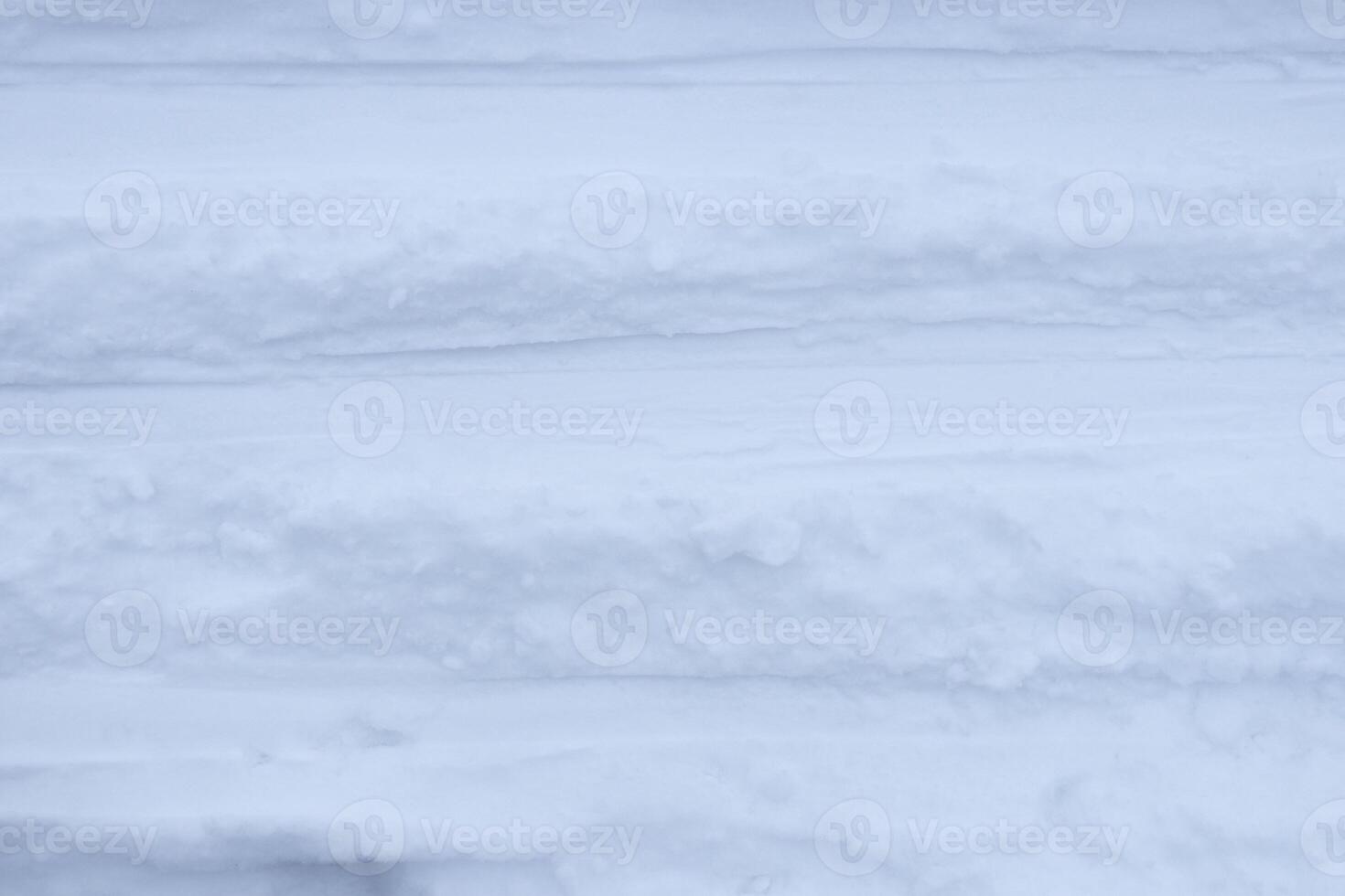 Ski run traces background. Snow skiing track surface. Ski trail texture. photo
