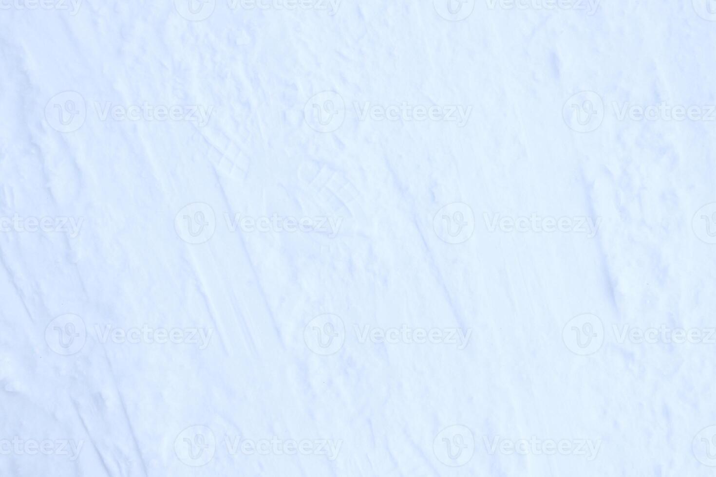 Snow skiing track surface. Ski trail texture. Ski run traces background. photo