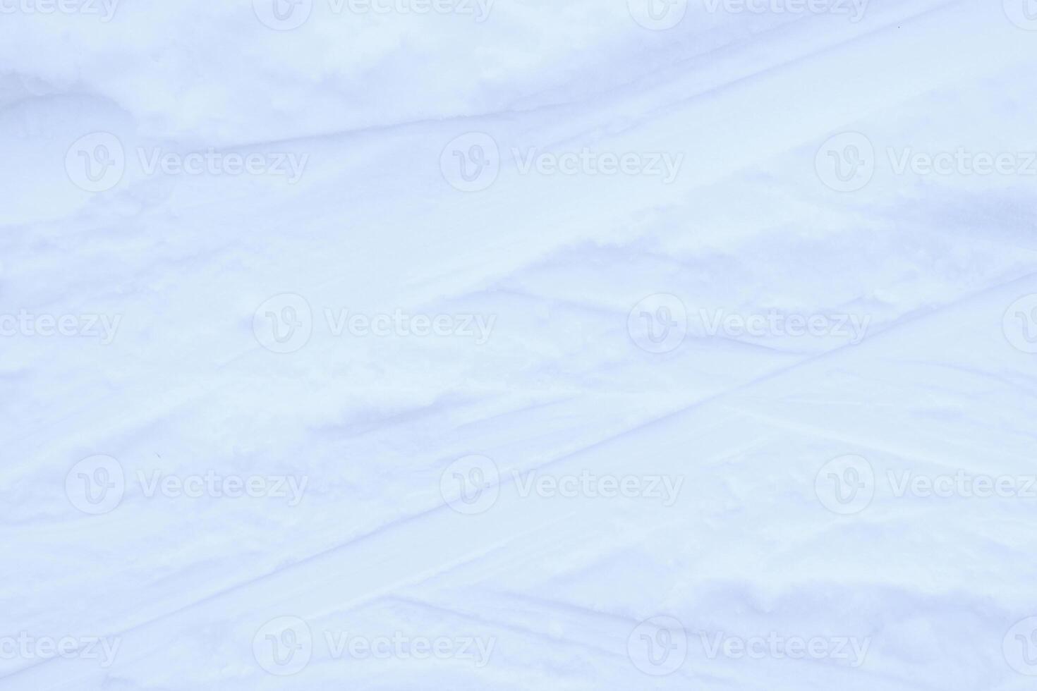 Snow skiing track surface. Ski trail texture. Ski run traces background. photo