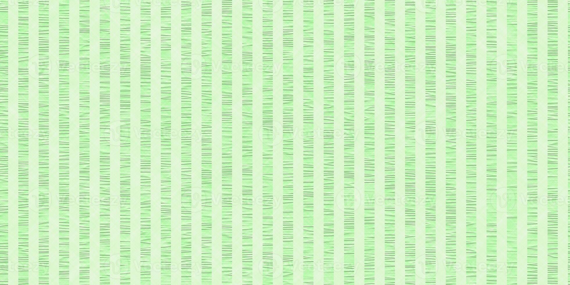 Light green wrinkled striped fabric backdrop. Pressed textile background. Seamless seersucker texture. photo