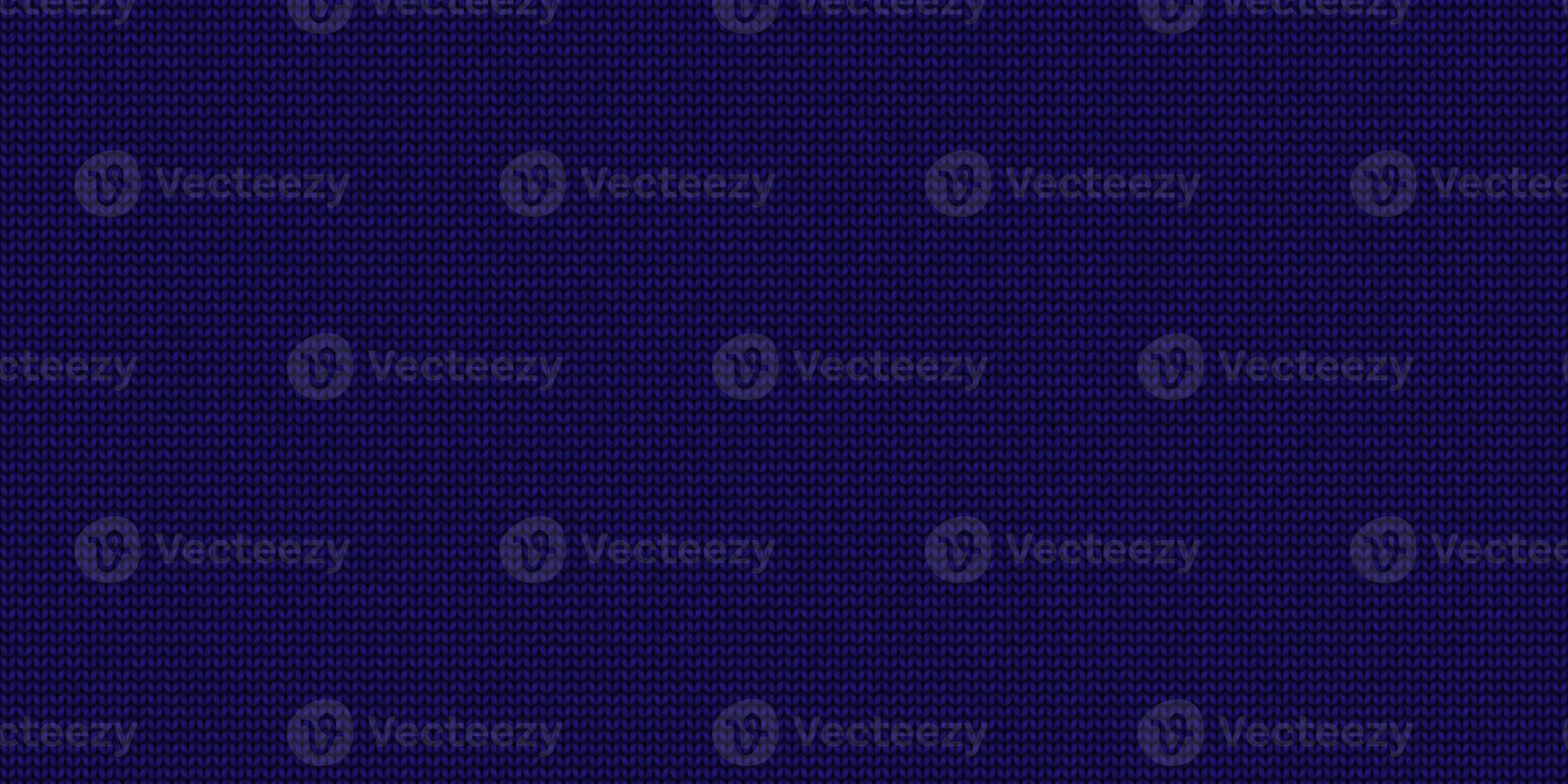 Blue knitting wear textile background. Seamless knit texture. Knitted clothes fabric surface pattern. Knitwear material backdrop. photo
