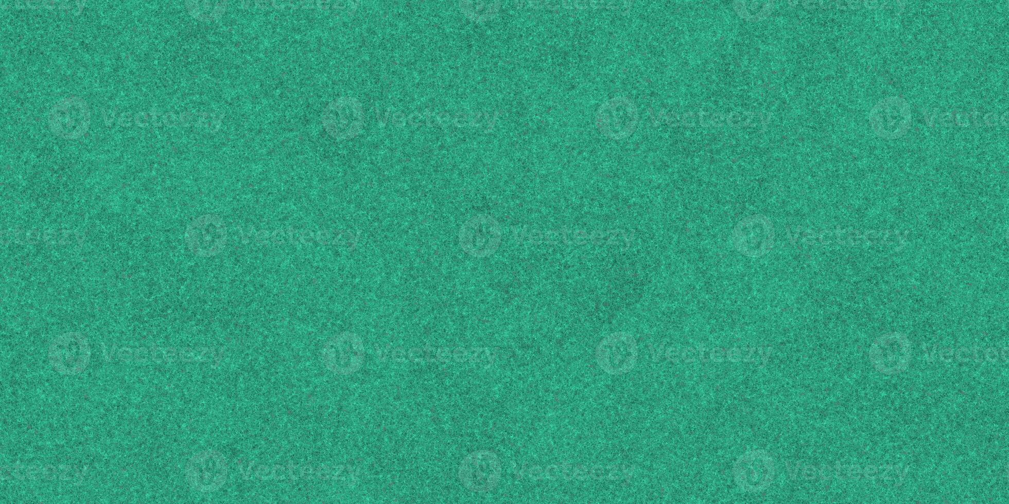 Turquoise felt material backdrop. Felt textile background. Felt fabric surface. Seamless felt texture. Felt clothes pattern. photo