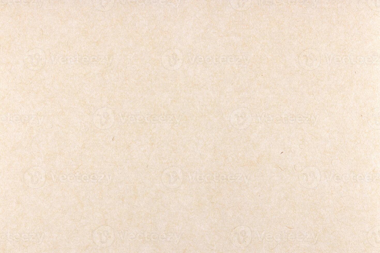 Decorative cream kraft paper texture. Decorated handmade craft paper background. Landscape horizontal orientation. photo